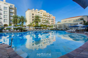 Suíte com vista para praia dentro de hotel - Seazone ILCTOP